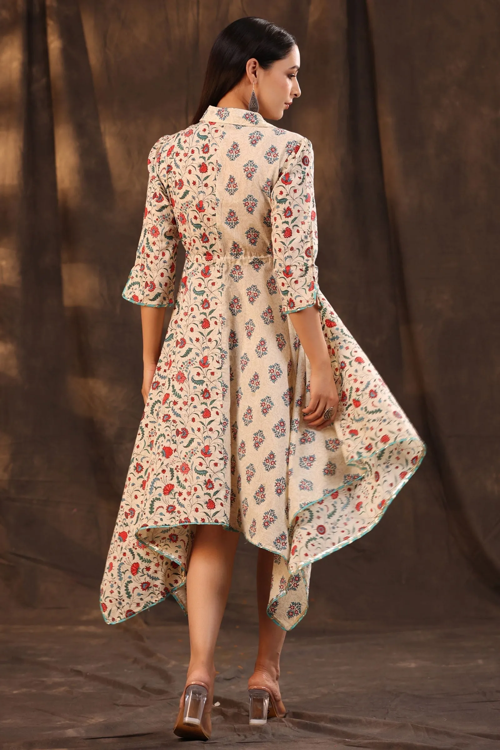 Jashvi Beige Pure Cotton Floral Printed Asymmetric Dress With Buttons.