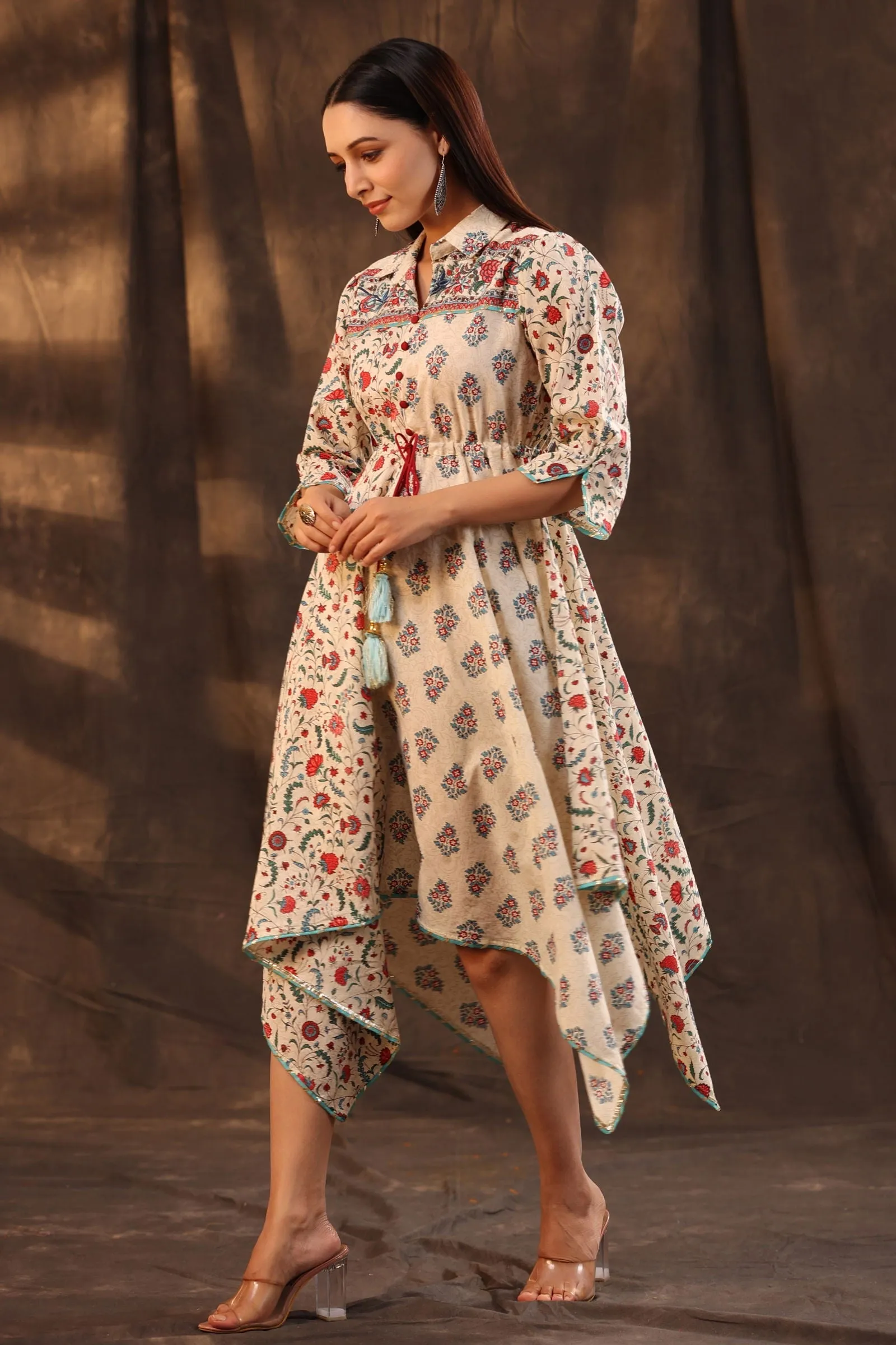 Jashvi Beige Pure Cotton Floral Printed Asymmetric Dress With Buttons.