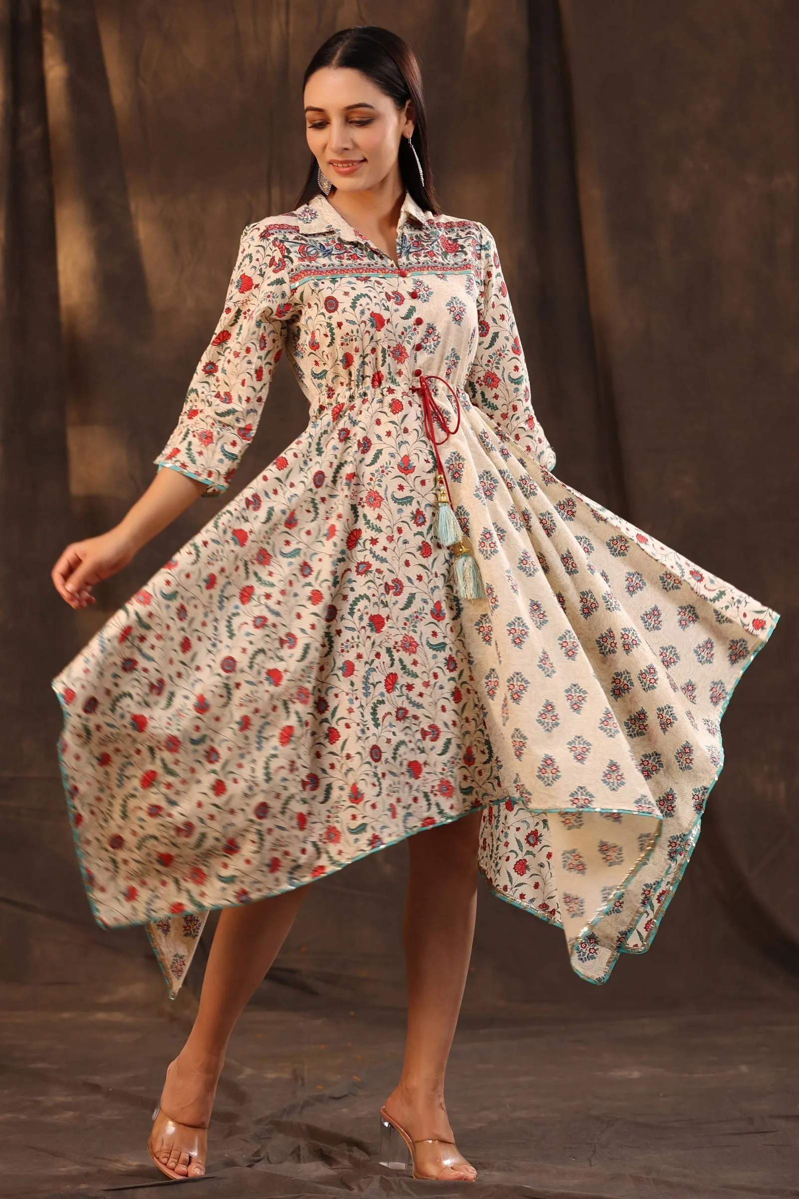 Jashvi Beige Pure Cotton Floral Printed Asymmetric Dress With Buttons.